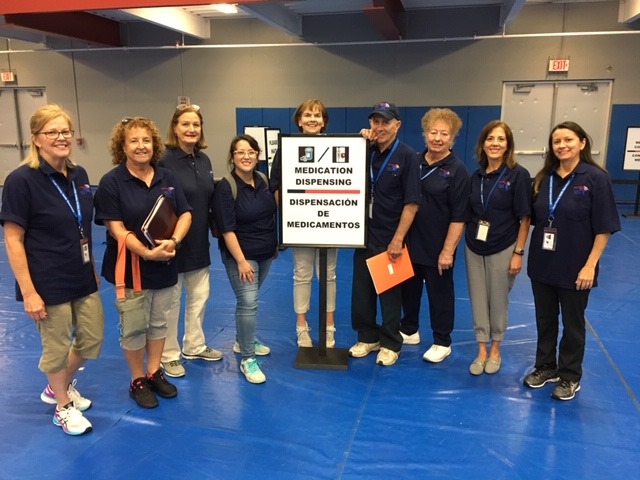 People volunteering at a medication dispensing event