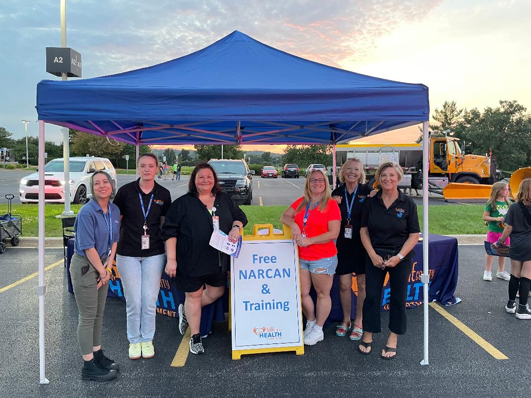 People volunteering at a Free Narcan and Training event
