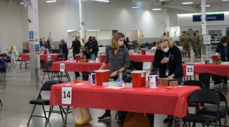 People volunteering at a vaccination event